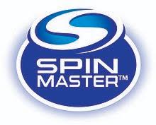 A blue and white logo features a stylised "S" at the top, above the words "SPIN MASTER™" in bold, white, uppercase letters. The text is set within a rounded, blue shape, outlined in white, with a subtle 3D effect.