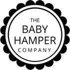 A round logo with a scalloped black border and a white centre. Inside, in uppercase black letters, it reads: “THE BABY HAMPER COMPANY” arranged in four lines. The design is simple, modern, and uses a clean sans-serif font.