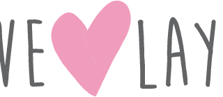 The logo features the words "LOVE LAYLA" in a playful, handwritten grey font. The "O" in "LOVE" is replaced with a large pink heart. A small registered trade mark symbol appears at the upper right of the final "A".