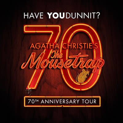 A poster with glowing red and orange text reads: "Have YOU dunnit? 70 Agatha Christie's The Mousetrap 70th Anniversary Tour." The number 70 and "The Mousetrap" are in neon-style script, with a small mouse illustration on the "p.